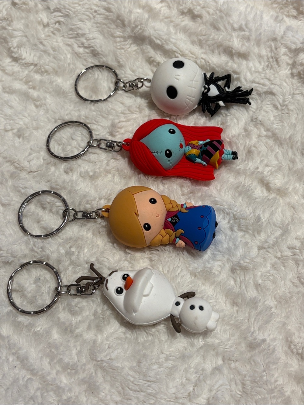 Set of 4 Kids Character Keychain Toys – White, Red, Blonde, White
